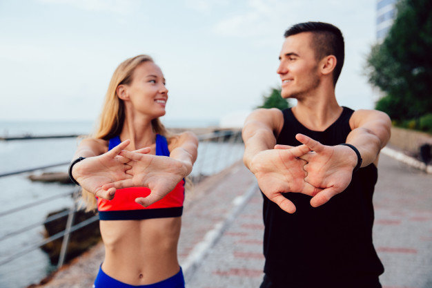 couple stretching together